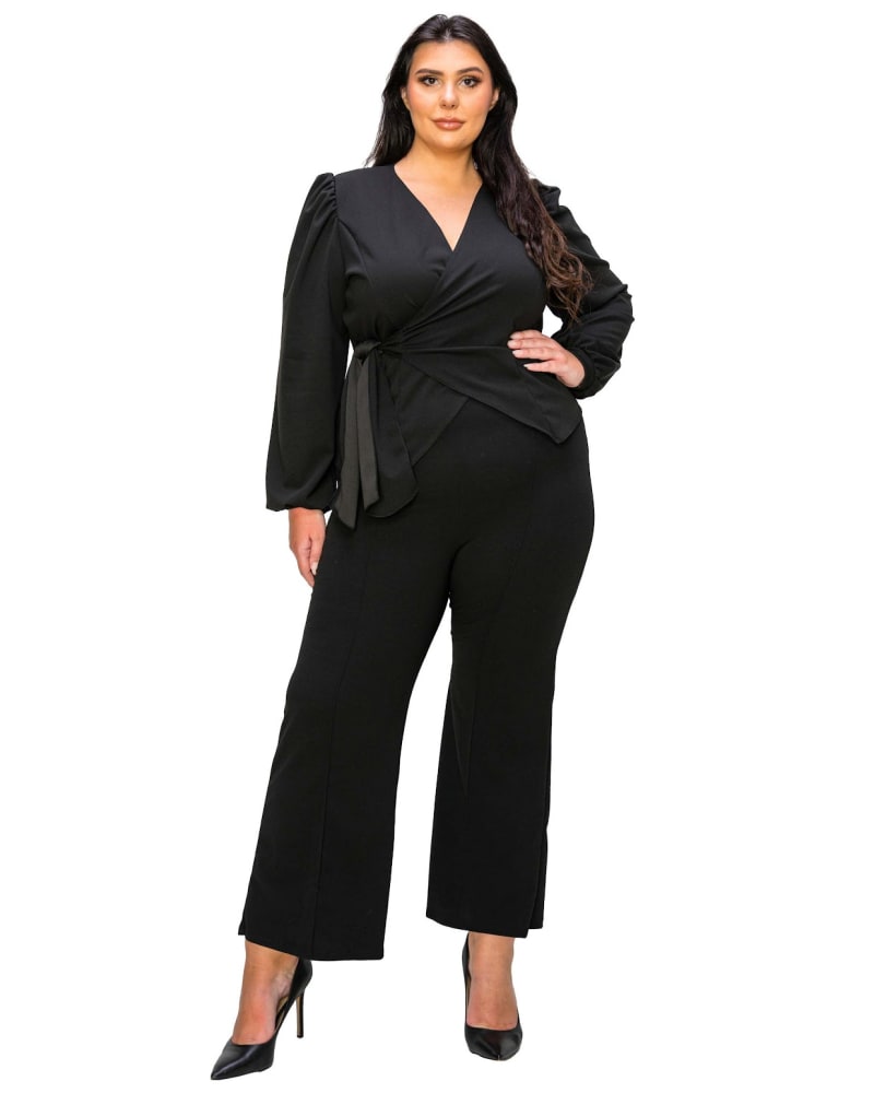 Front of a model wearing a size 3X Yelena Crepe Wrap Top in Black by L I V D. | dia_product_style_image_id:367361